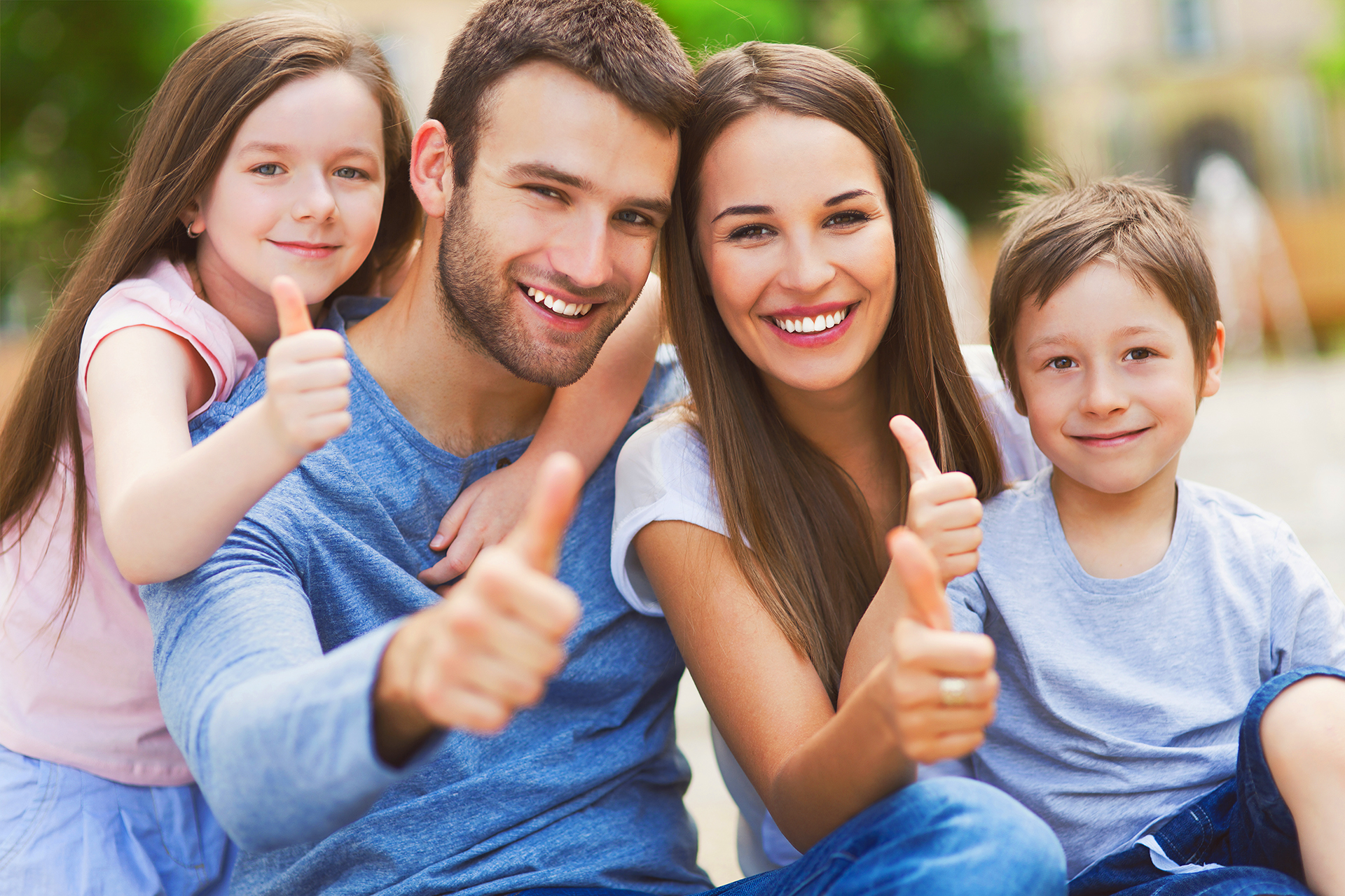 A Family Holding Thumbs Up In Comfort By Knowing the Law Provides Various Family Law Rights